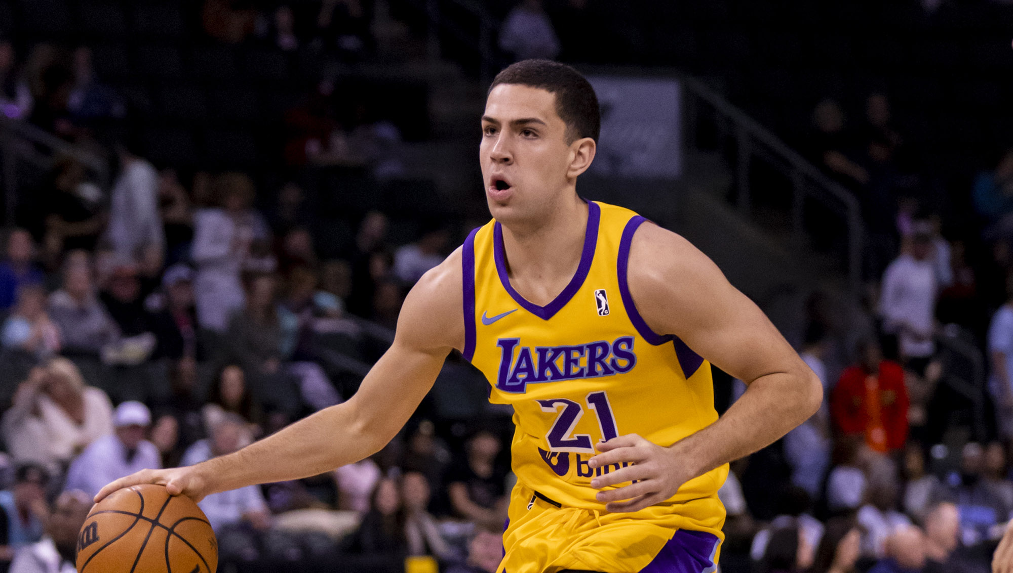 Cole Swider dribbles the ball