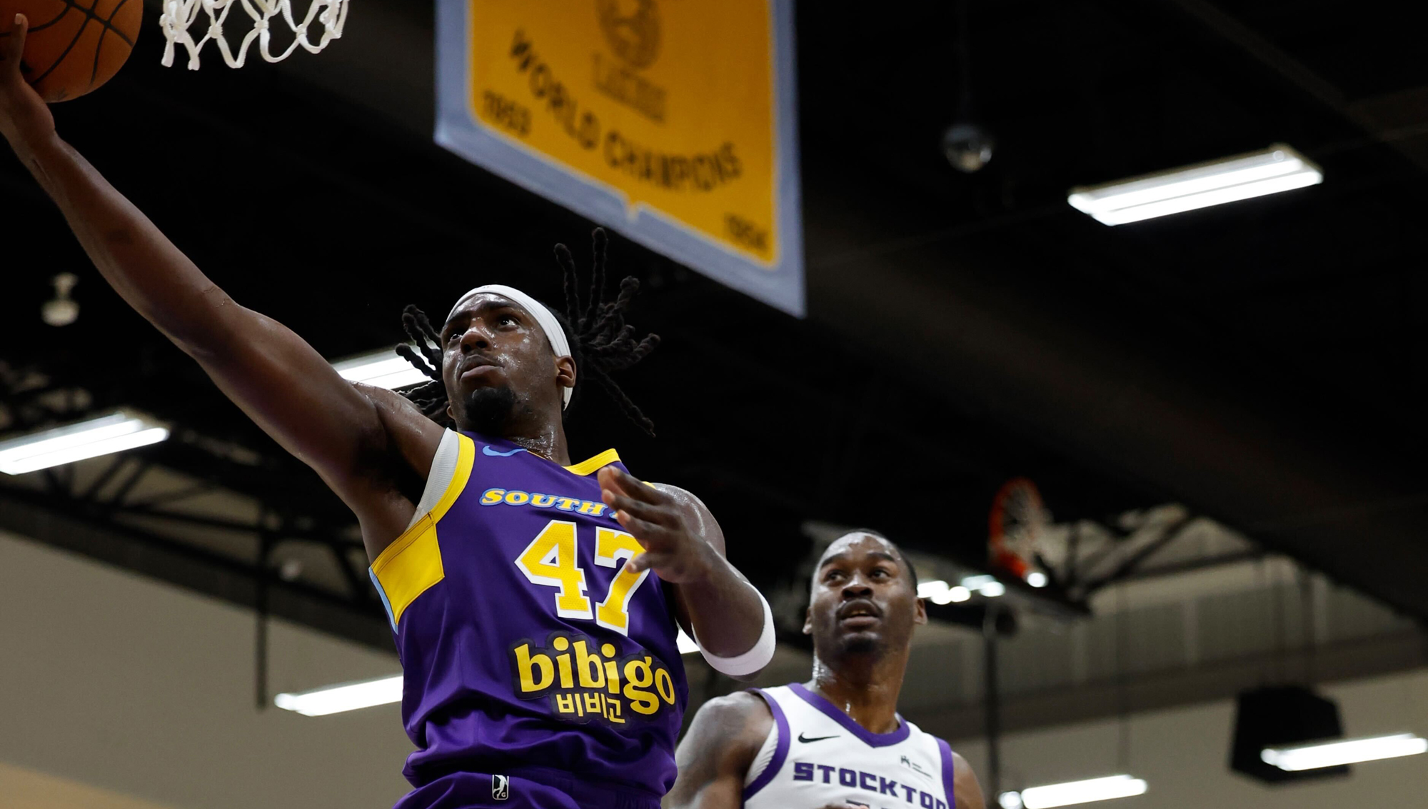 SOUTH BAY LAKERS FALL TO STOCKTON ON LAST-SECOND THREE
