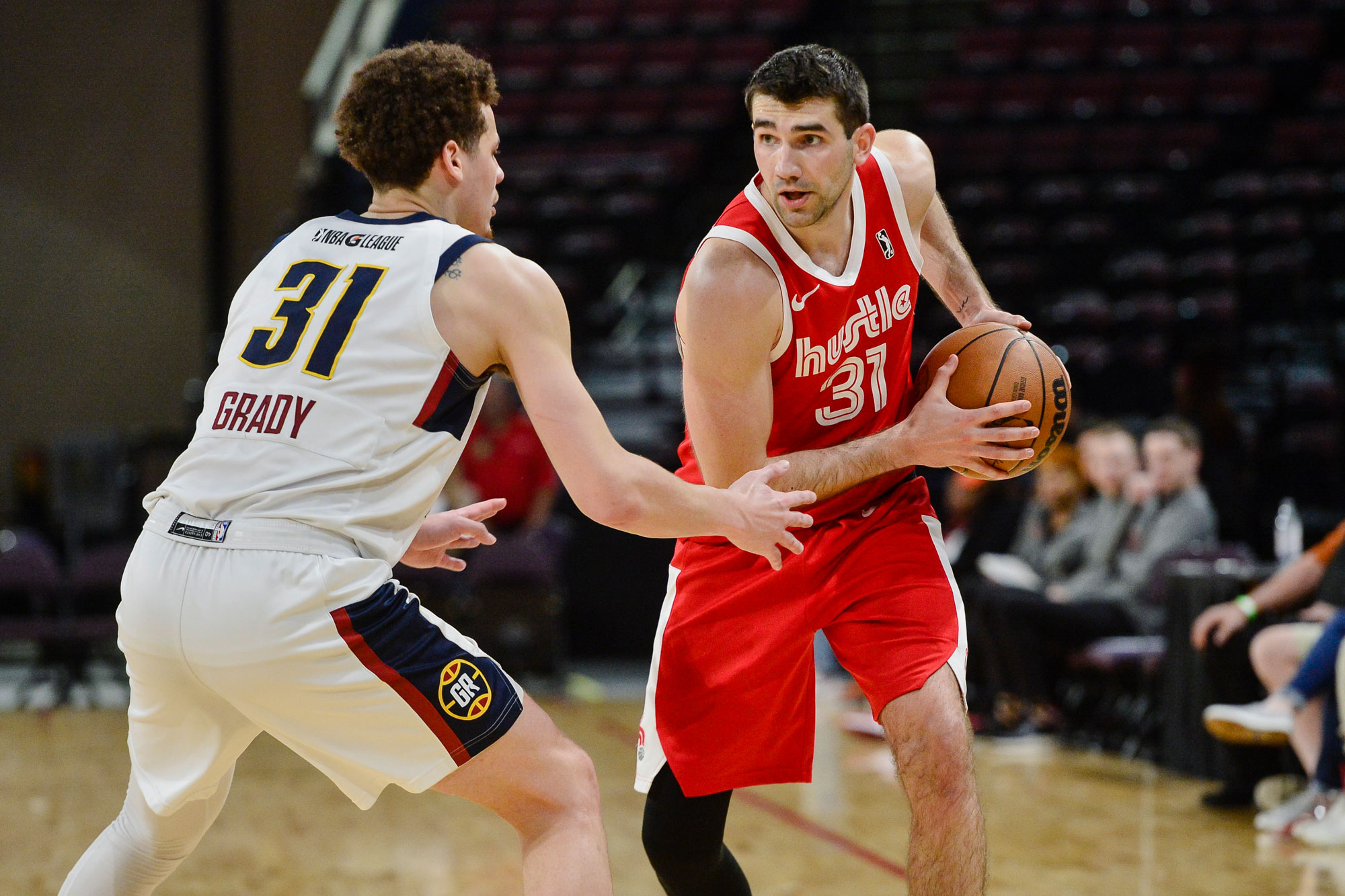SOUTHAVEN, MS - FEBRUARY 28: Dakota Mathias #31 of the Memphis Hustle handles the ball against Kellan Grady #31 of the Grand Rapids Gold during an NBA G-League game on February 28, 2023 at Landers Center in Southaven, Mississippi. (Photo by Brandon Dill/NBAE via Getty Images)